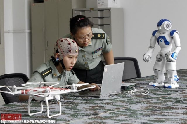 PLA working on controlling robots with brain signals 3