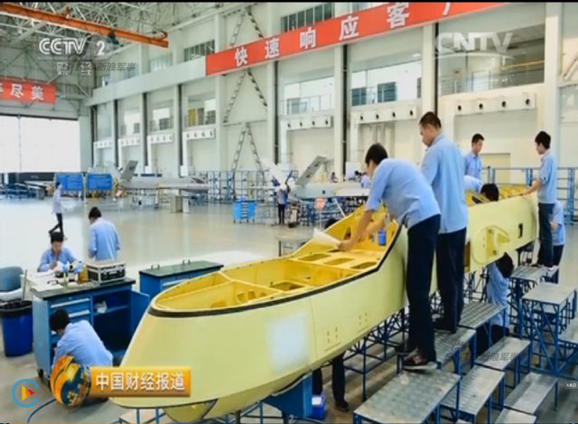 Chinese CCTV 2 channel screen grab of Pterosaurs unmanned attack drone production plant 8