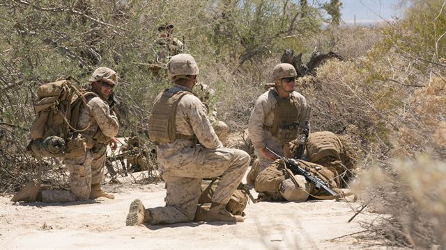  Scout snipers with 2nd Battalion, 8th Marine Regiment, wait for extraction during Integrated Training Exercise 3-16, outside of the Combat Ville training area aboard Marine Corps Air Station Yuma, Ariz., May 29, 2016.  Photo By: Cpl. Thomas Mudd 
