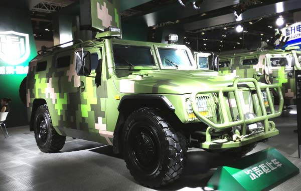 A vehicle-mounted sonic weapon system is on display at the Second China Military and Civilian Integration Expo in Beijing on Monday . [Photo by Zhao Lei/chinadaily.com.cn]