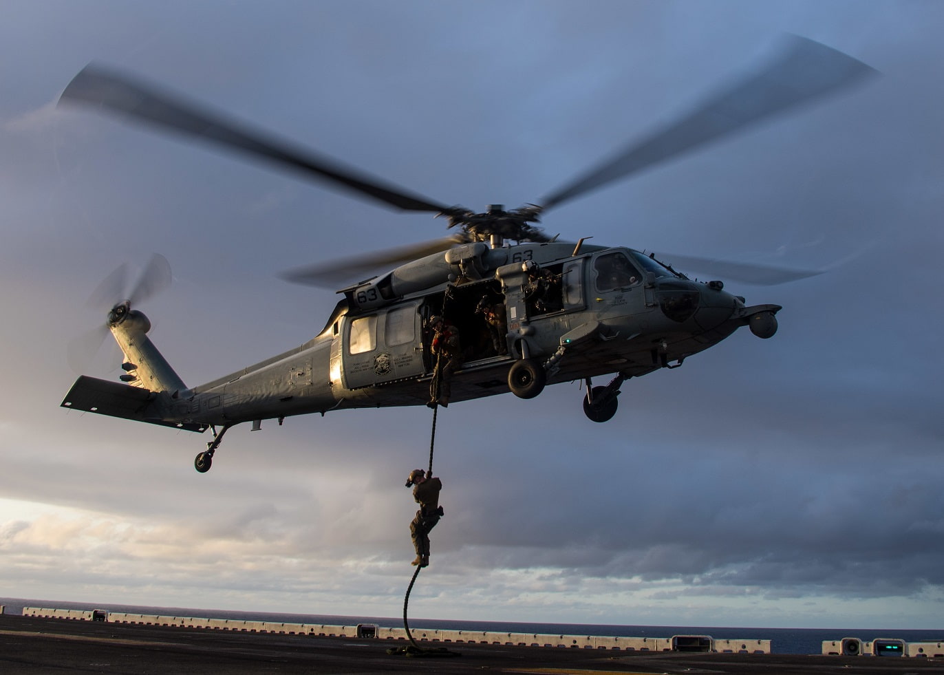 U.S. Marines conducts fast rope exercise from MH-60S Sea Hawk