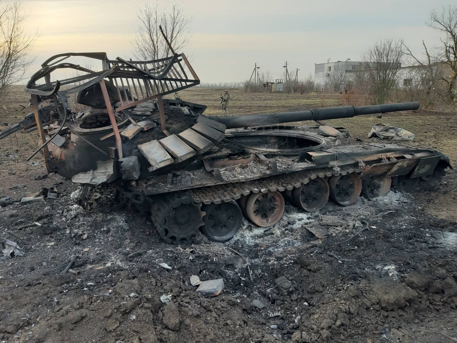 https://defence-blog.com/wp-content/uploads/2023/02/Destroyed_T-72B3_with_cope_cage_1.jpg